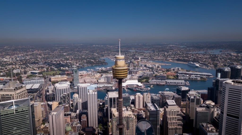 A view of the Sydney Tower from the air on a sunny day.