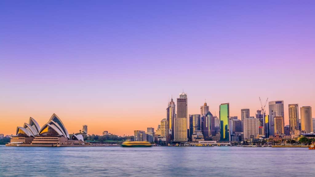 A sunset view of Circular Quay and the Sydney Opera House.