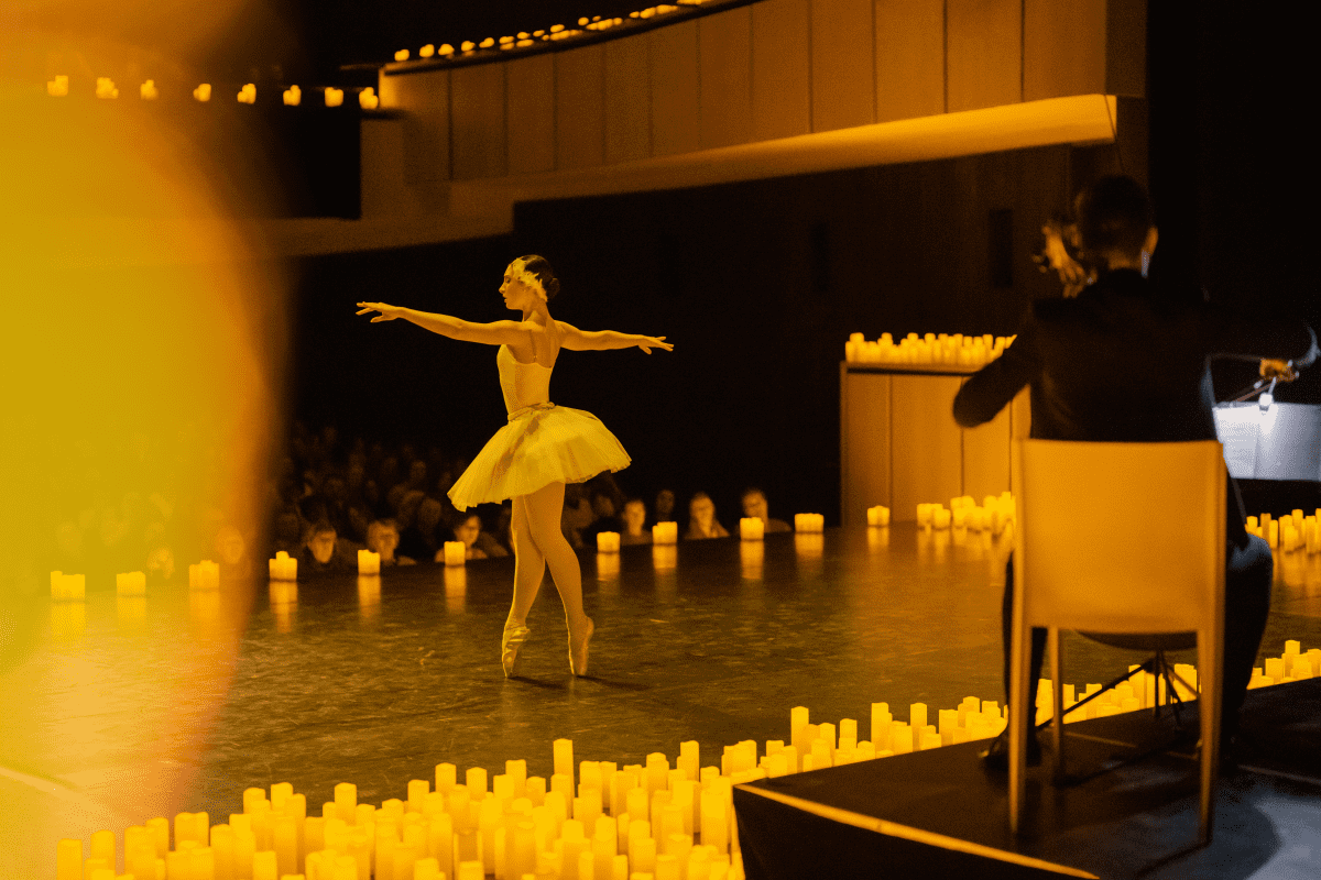 Ballerina performing by candlelight