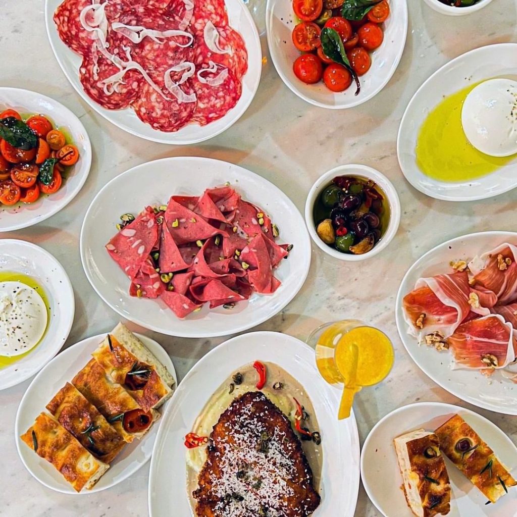 birds eye view of table filled with Italian brunch eats at Fortuna in sydney