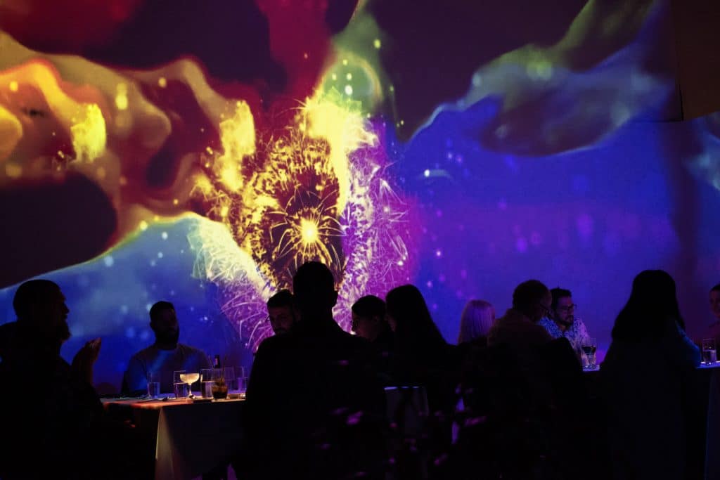 image of video mapping wall during immersive dining experience