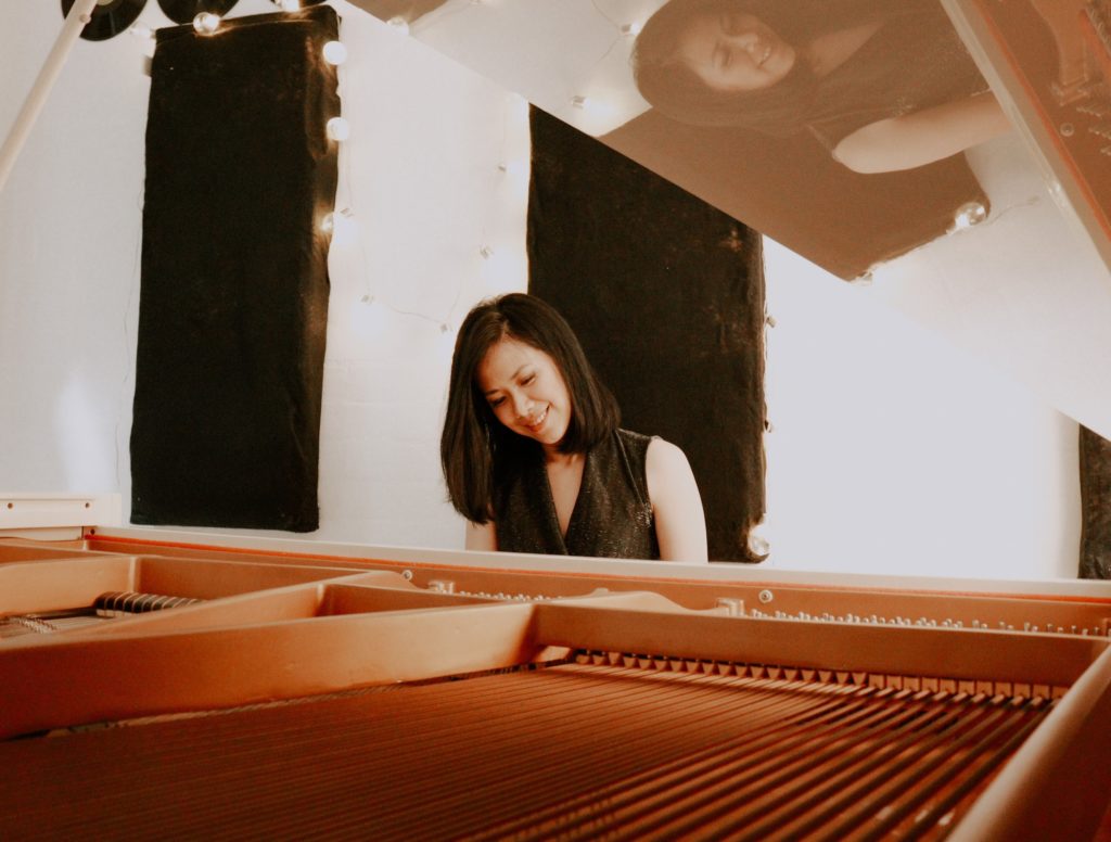 Amanda Suwondo playing piano