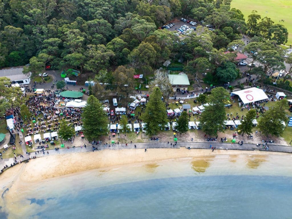aerial shot of a waterfront market at the greek summer festival