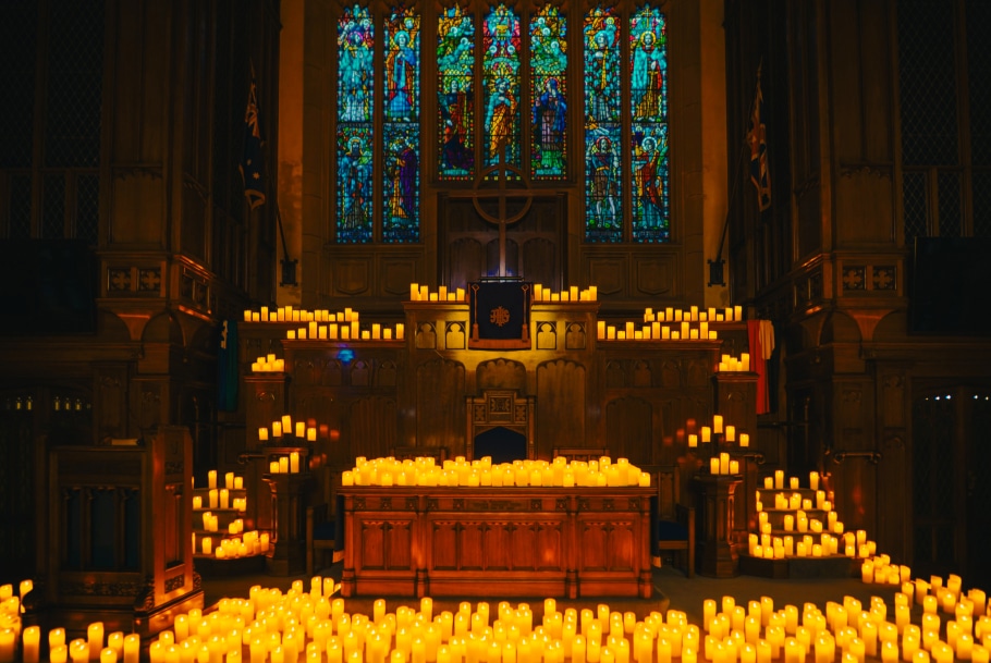 Candlelight concert interior showing a chest with hundreds of candles