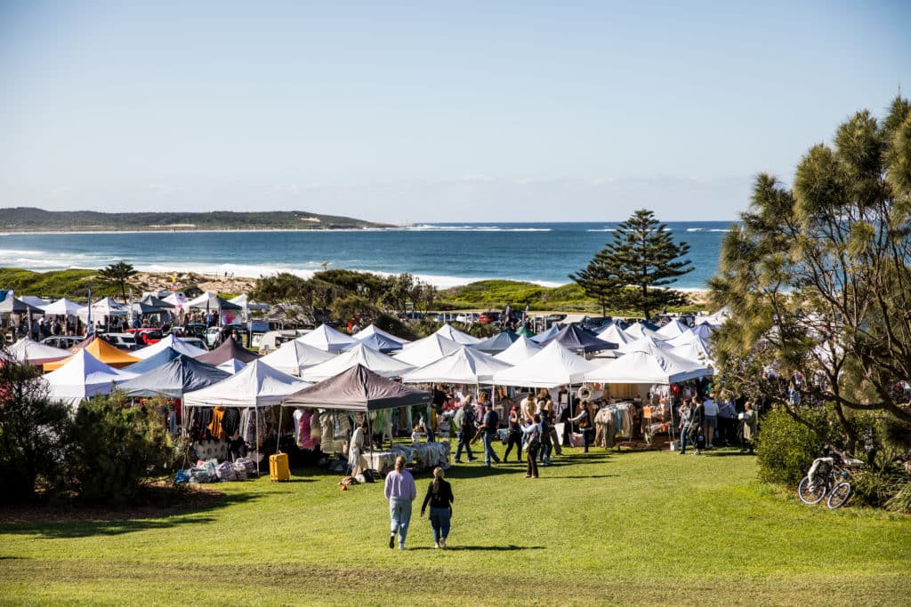 people shopping at the beachside cronulla winter market in sydney