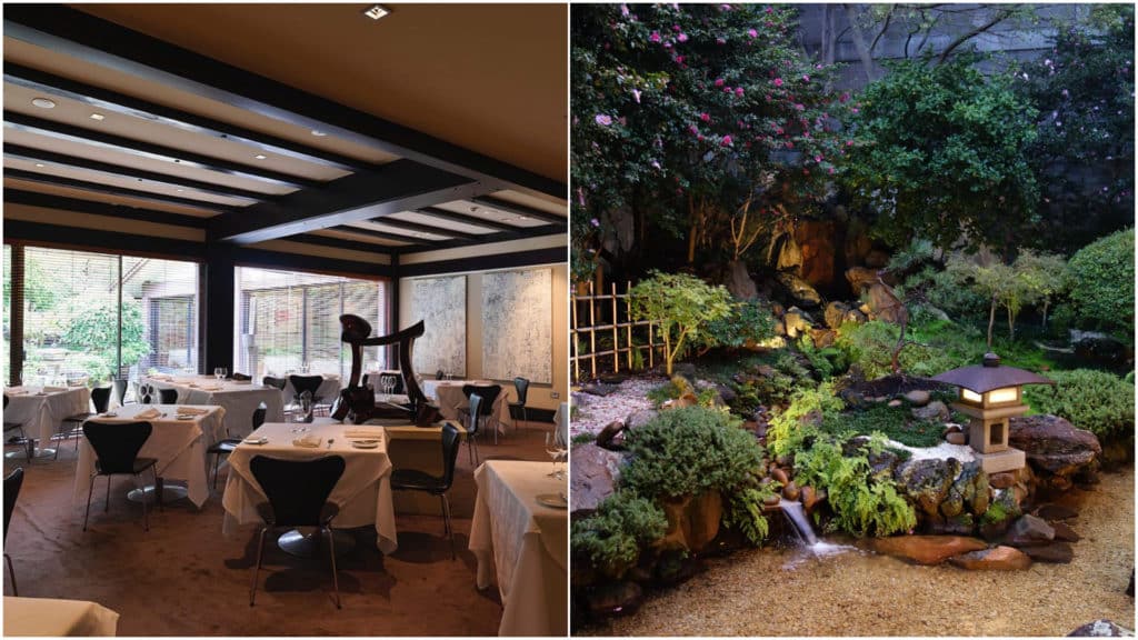 a Japanese garden with pink camellias in bloom and a dimly lit restaurant