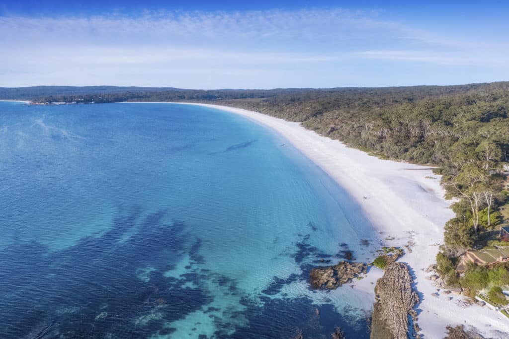 Scenic coastal views showing the white sand of Hyams Beach in Jervis Bay.